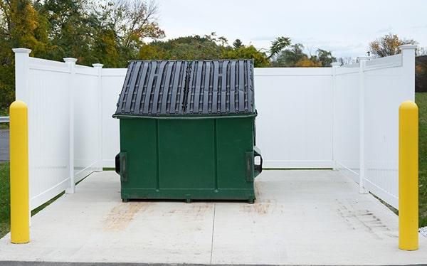 all of our commercial dumpsters come with lids to keep debris contained and prevent weather damage